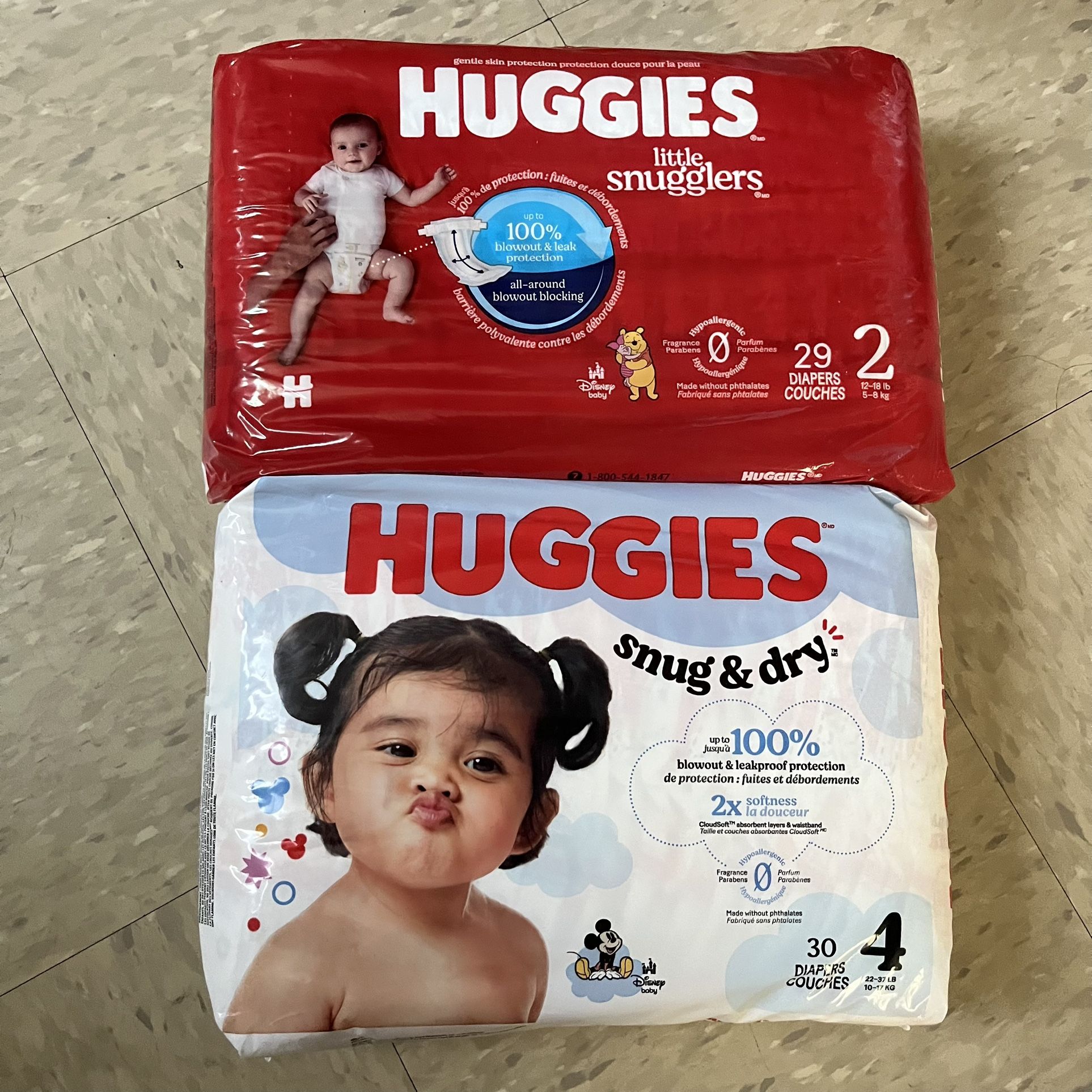 Huggies Little Snugglers Diapers Size 2 and Snug & Dry 4