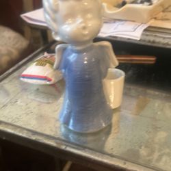 Angel career candlestick, antique porcelain