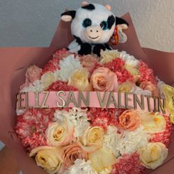 Flower bouquet with plushy and custom ribbon