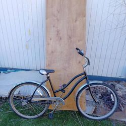 I have this fantastic vintage rustic black female's beech cruiser bike