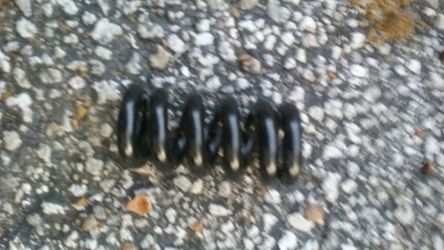 Spring for basketball hoop setup