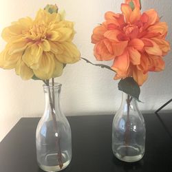Pair of Faux Orange and Yellow Flowers In Clear Glass Carafe Vases  