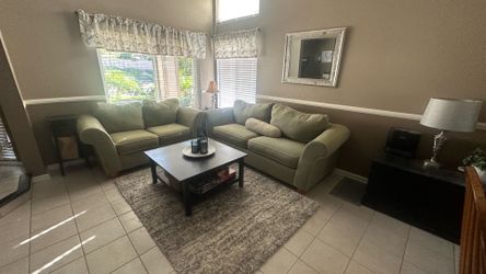 Couch and love seat and kitchen table.