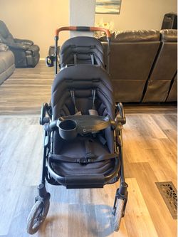 Baby stroller with bassinet attachment in two seats in great condition.