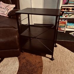 🤩💓🤩💓$50 Beautiful black microwave cart/table or storage shelf /stand. 2'5" tall X 2 ft wide X 1'4" deep. Nothing wrong with it at all. Just sellin