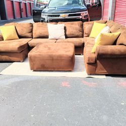 Brown U Shaped Sectional With Ottoman 