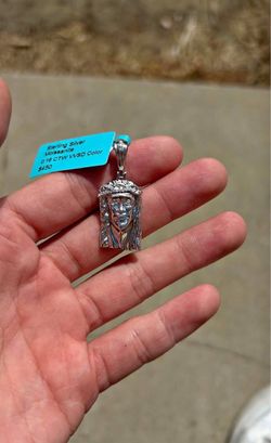 Jesus piece pendant (moissanite diamonds .925 silver)