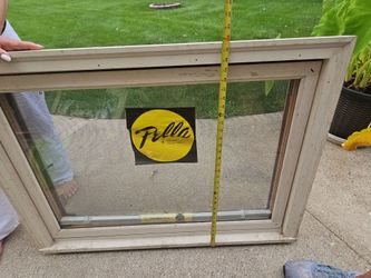 Pella wood casement window with built-in blinds
