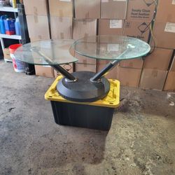 BEAUTIFUL GLASS ADJUSTABLE COFFEE TABLE IN EXCELLENT CONDITION. IT OPENS AND CLOSES ACCORDING TO YOUR NEEDS. NICE MODERN LOOK. $200.00 OR BEST OFFER. 