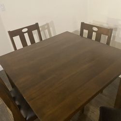 Wooden Tables And 4 Matching Chairs