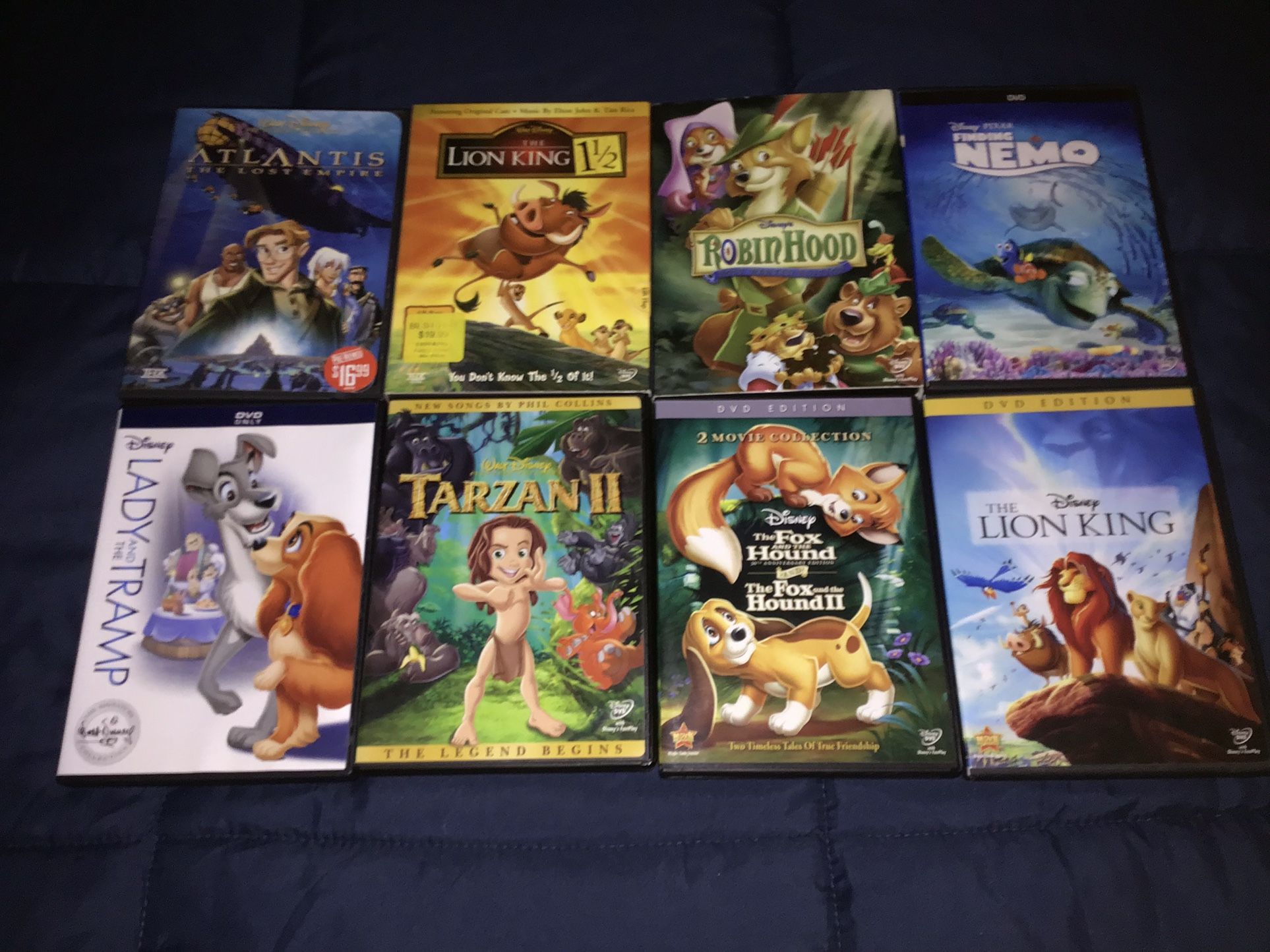 $2 Disney DVDs Finding Nemo Robin Hood
