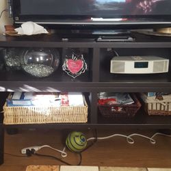 Two piece tv stand , chocolate color in very nice condition !