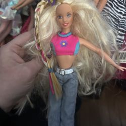 A Bunch Of 80s And 90s Ken And Barbie Dolls