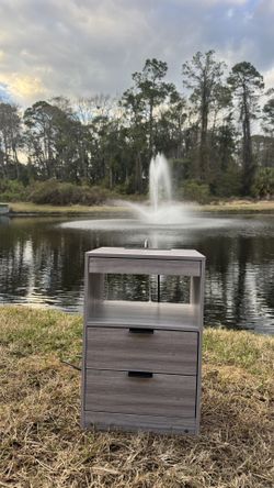 Nightstand ,,, It has 2 outlets, 2 USB ports, a colorful LED, a charger and a phone.