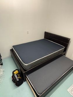 Full over twin size bed frame with mattresses