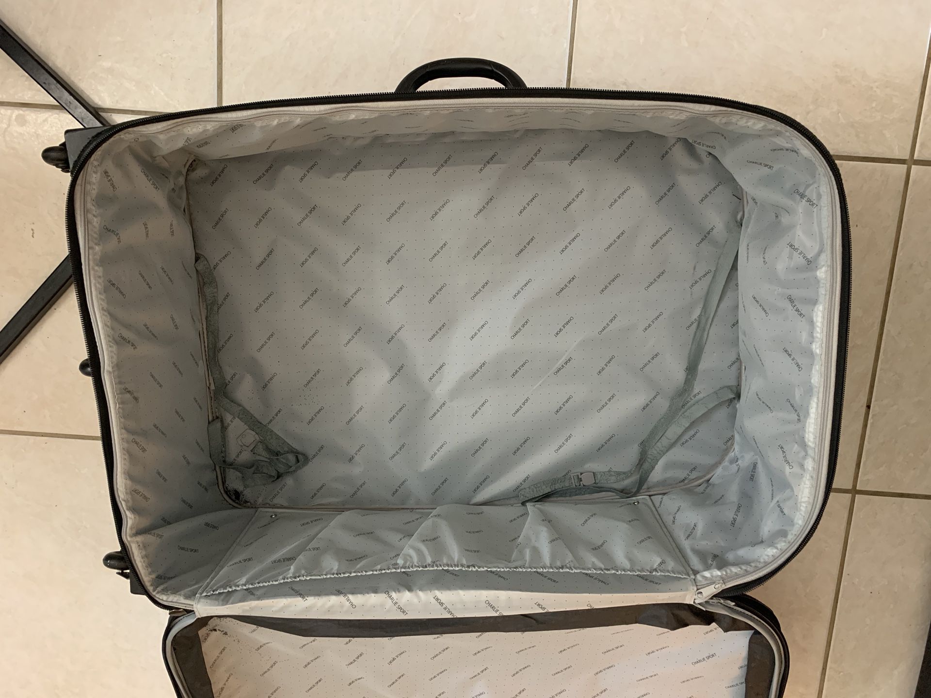 Large Suit Case, On Rollers
