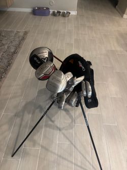 Taylor made Q irons full set includes sandwich and a 60° wedge 60° wedge is a Nike three hybrids brand new fusion driver 8 1/2 pair of used shoes, two