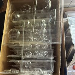 2 boxes of used plastic candy molds 