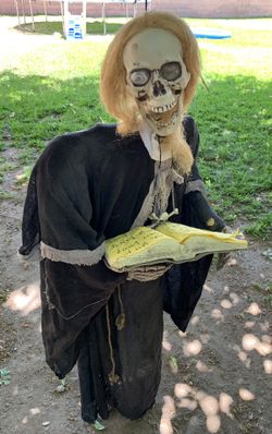 Hanging Skeleton Priest With Bible Halloween Prop