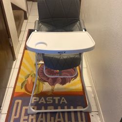 Hi Chair Easy Fold For Travel Price 24$. Pick Up.  E.  72. and Grand View.  E. Tacoma 
