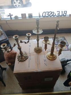 "3 BRASS CANDLE HOLDERS"