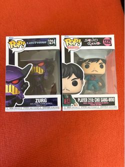 Pop funkos squid game and Disney light year zurg
