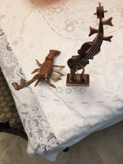 Bahamian wood violin and lobster