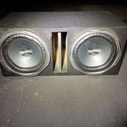 2 12 " 1200watt Sony XPLOD Subwoofers Installed In A Box