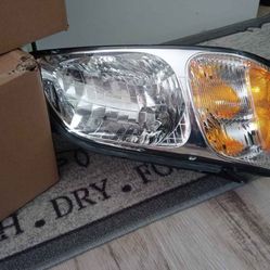 Brand new headlights for 00-06 Subaru legacy L and Brighton Baja brand new in the box MAKE OFFER