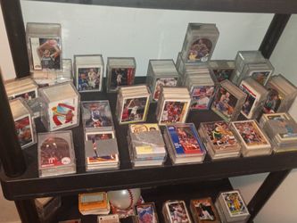 lots of baseball and football cards some basketball cards