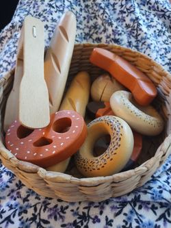 Kids toy breads in wicker basket