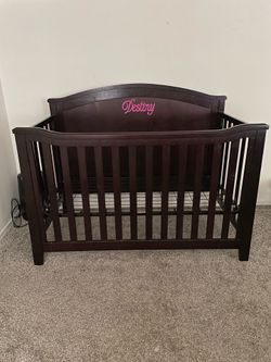 Dark Wood Baby Crib with Slatted Sides