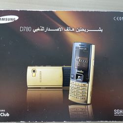 Samsung D780 dual SIM mobile phone in gold.