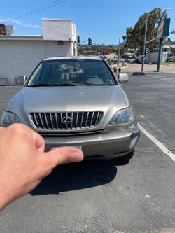 Lexus rx300 new brakes new tires new oil change Ac cold  run, and drive good  Pass smoke check