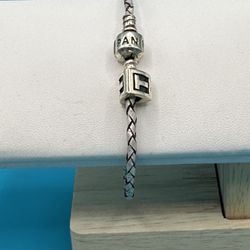 Pandora Sterling Silver Braided Bracelet With T Triangle Charm SZ 6 3/4” & Weighs 7.68 Grams Good Condition 