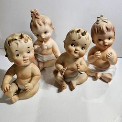 4 Vintage Napco. Kewpie Baby Figurines 