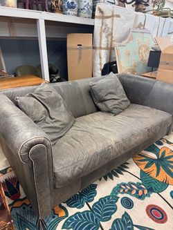 Gray Leather Loveseat with Throw Pillows