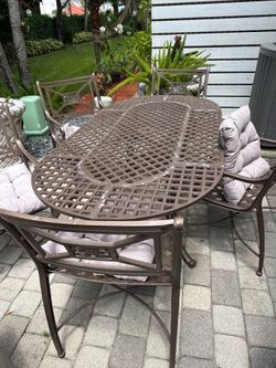 Mesa de patio con 6 Sillas