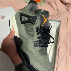 Undefeated Jordan 4 Tried On