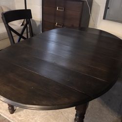 Antique well loved drop leaf and expandable table (two center leaves)  50" w with side drop leaves 