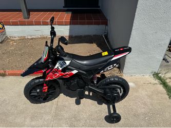 Aprilia Rx 125 power wheel toy