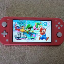NINTENDO SWITCH LITE MOD with 120 POPULAR SWITCH GAMES and 7500 CLASSIC ARCADE GAMES