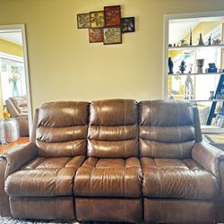 Brown Leather Powered recliner sofa and loveseat with powered adjustable