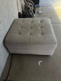 Tan couches with middle square
