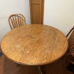 48” round table with 3 chairs