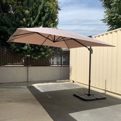 (NEW) $195 Hanging Patio 10x10 FT Offset Umbrella with Crank, Tilt, Cross Stand (Include 4pcs Base)