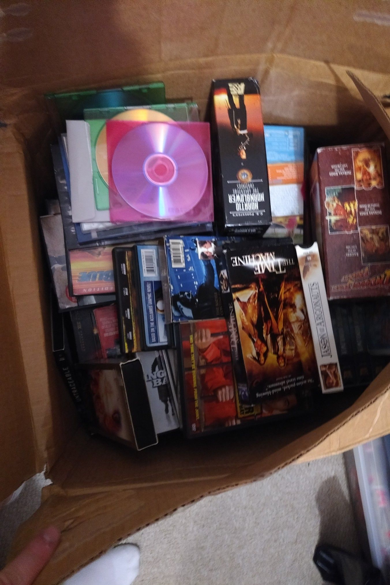 Large box of dvds and vhs