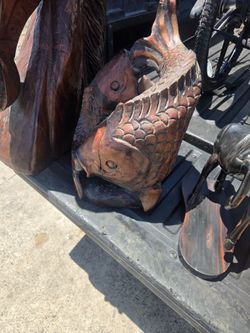 Escultura de pescadoa