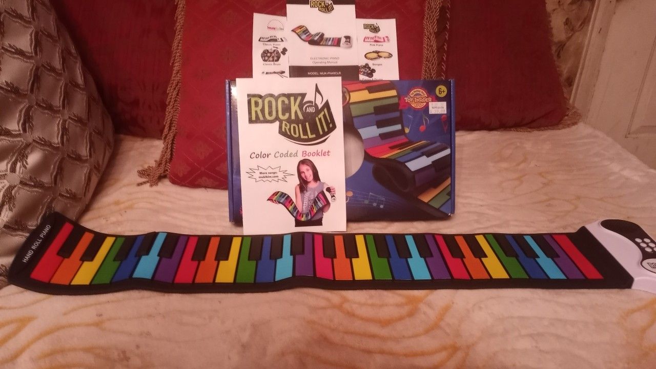 Rock And Roll Rainbow Roll Up Piano