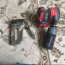 staple gun and saw grinder 